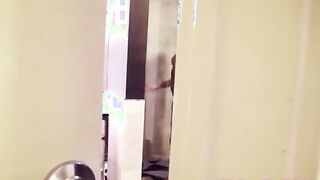 Hot young brunette in the shower spied on