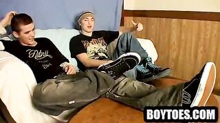 Two horny amateur hunks showing off their feet