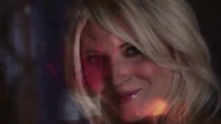 blond fingering pussy before fireplace