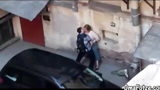 A man fucks hard chubby mature's mouth in public