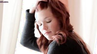 Sensual redhead babe stripping