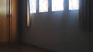 Babe with tattooed butt strips in front of cam