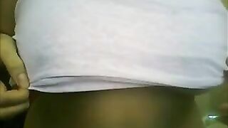 Latina Teases Her Tits And Ass