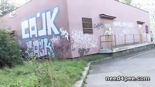 Naked blonde tanning in public takes a piss