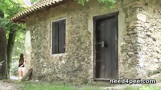 Cute teens spreading legs and pissing outdoor