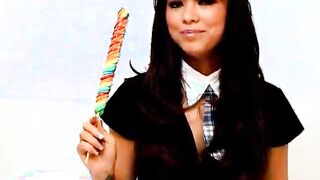 Gorgeous brunette amateur British teen with pierced tongue Natalia sucking a lollipop with lust