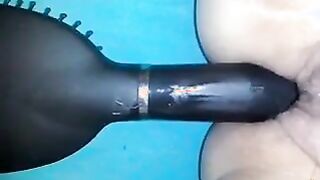 Putting A Hair Brush In The Pussy