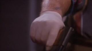 Kristin Minter shows off her breasts