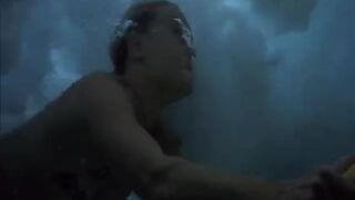 Fearless Blonde Clad In 2-Piece Surf On Beach