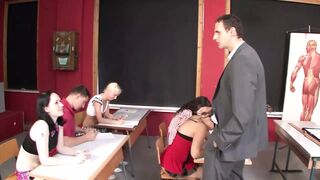 Brunette teen penetrated on the school desk by the teacher