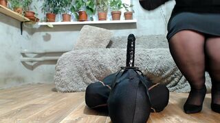 Mistress teases a slave