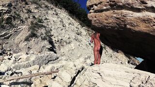 Travel slut teases a videographer and fucks him on the beach