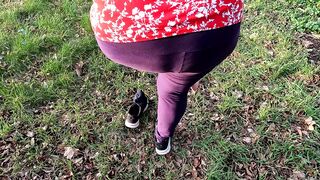 Barefoot on the meadow treats naked tits