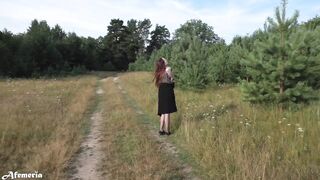 Lustful brunette undresses in the woods and walks naked